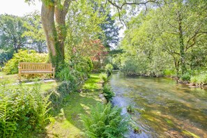 Our garden bench by the River Crake