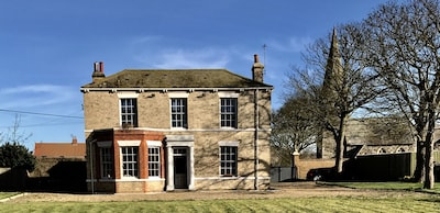 Detached Victorian Vicarage with walled garden in small village by the Sea......