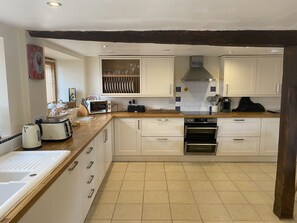 Spacious well equipped kitchen. 