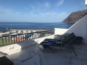 Terrace with views over cliffs and harbour