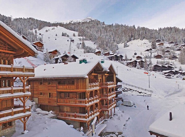 View of the chalet - next to the piste & just a short stroll to the village!