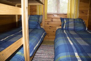 View of the bedroom showing 1 bunk bed and  one single
