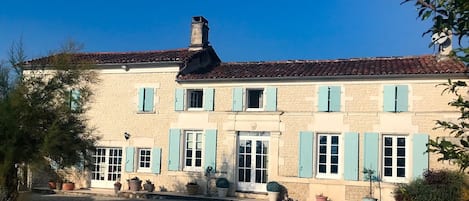 Entrance courtyard and house