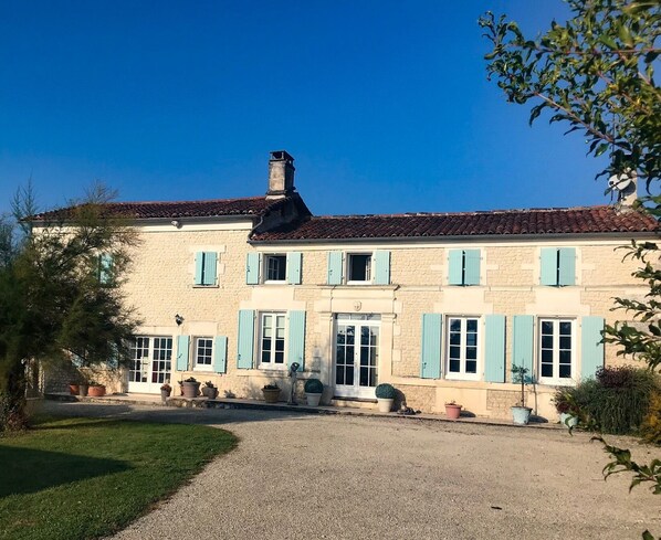 Entrance courtyard and house