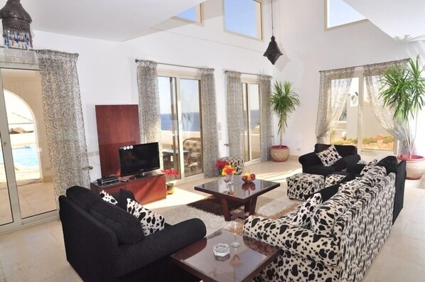 Living area with panoramic sea view, with a terrace include a private swimming pool