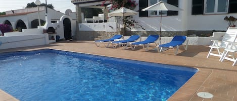 The private heated pool, terrace and barbecue area