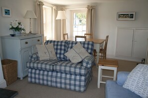 Sitting Room with dining table and chairs