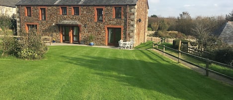 Rock Cottage showing its large front garden.