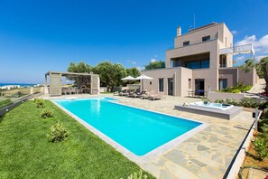 The outdoor areas and facade of the villa!