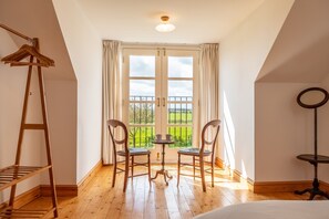Gallery Cottage, Wighton: Master bedroom with views across open countryside