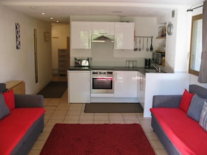 Well equipped kitchen + dining table and seating for 6.