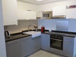 The fully-equipped kitchen area
