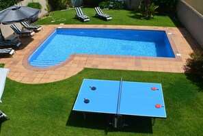 over view of table tennis table and pool