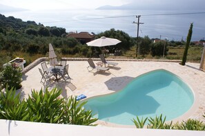 The pool terrace viewed from the upper terrace