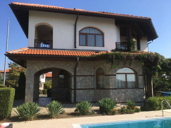 Rear or Villa showing balconies off of both bedrooms