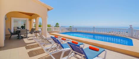 South facing terrace and pool with spectacular sea views