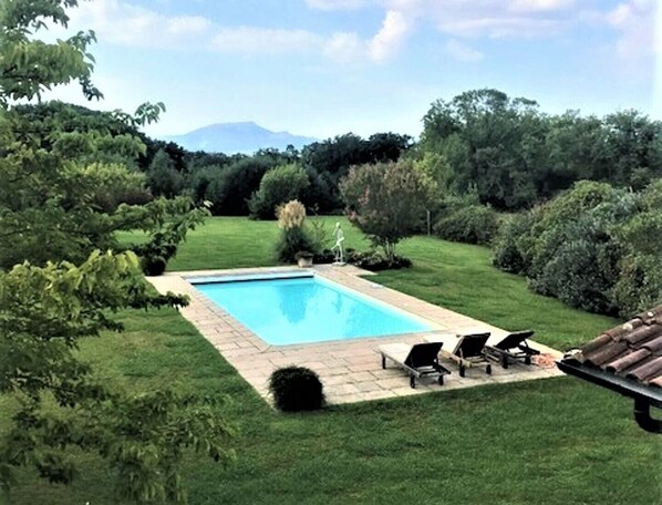 Pool and garden with views of the Pyrenees