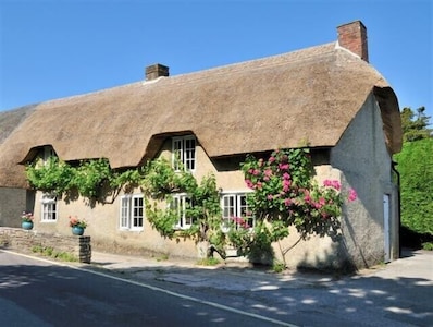 Thatched cottage at Studland Bay close to beach