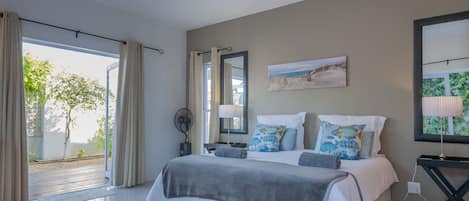 Main bedroom with double french doors to garden