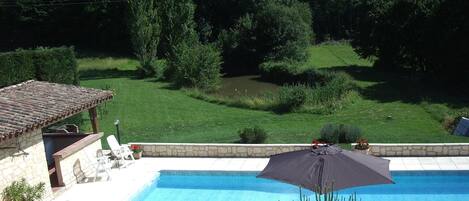 View from the Covered Terrace towards our meadow and lake