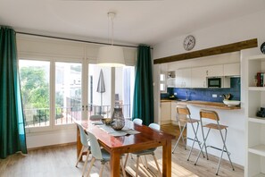 Open plan kitchen/ dinning room  over looks terrace and garden.