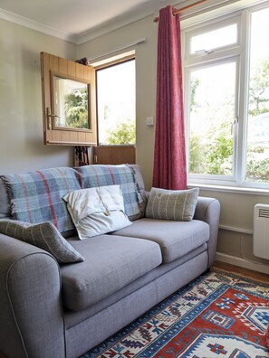 The front stable door keeps dogs and children safe whilst letting in the sea air