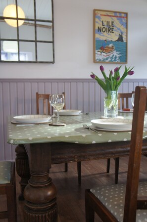 The dining table-bright and sunny in the summer.....