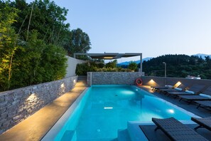 32 sq. m ecological heated swimming pool with mountain views