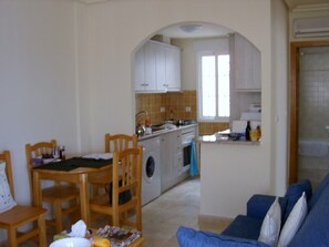 Looking from the lounge to the kitchen