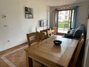 Large Lounge & Dining Area with Doors to the Terrace