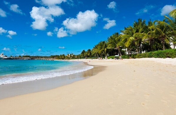 This is our beach. The gate from our apartment  on the right through the hedging