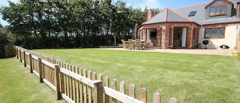 View of the back of the house from the meadow