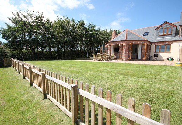 View of the back of the house from the meadow
