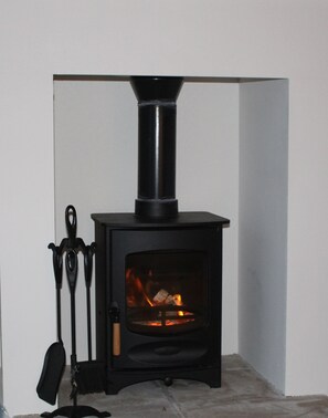 Woodburner in lounge area can warm most of the property even in winter.