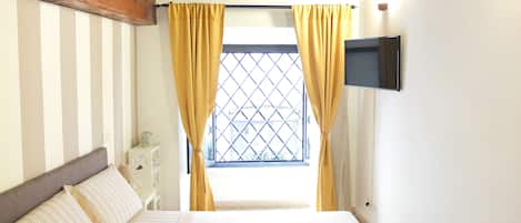 double room with antique ceiling dated 1520's and window 