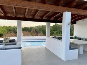 Upper terrace view to pool and olive grove. 