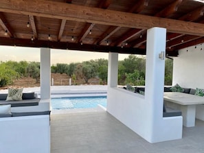Upper terrace view to pool and olive grove.