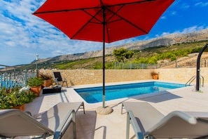 Patio with pool and seaview