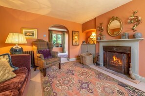 The Old School House, Warham: Snug with open fire