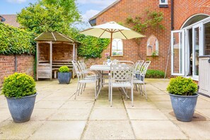 Dine al fresco in the sheltered garden