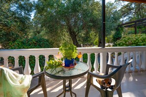 Balcony view%2E The house is surrounded by olive trees and rich Corfiot flora