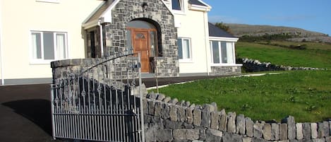 Front Entrance with ample car parking front and rear.