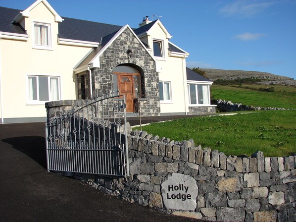 Front Entrance with ample car parking front and rear.