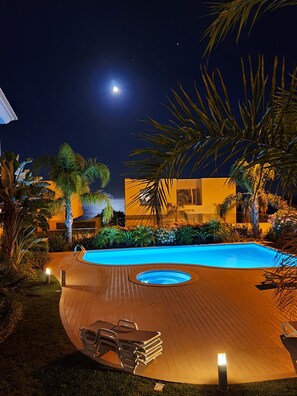 Full moon and star gazing over the pool and ocean from the balcony