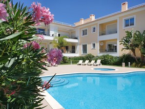 View of apartment and pool area
