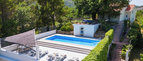 Private pool 10m x 4m with hydro massage, sun deck and absolute privacy