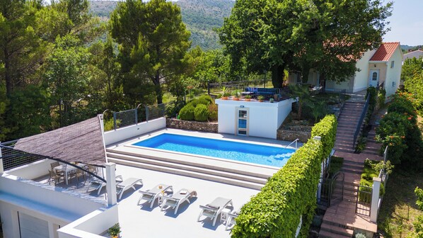 Private pool 10m x 4m with hydro massage, sun deck and absolute privacy