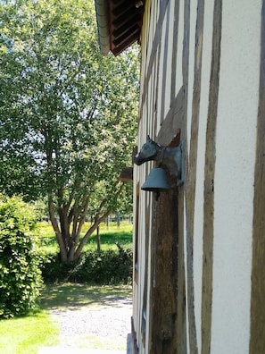 The front door with its friendly cow
