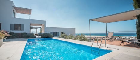 THE VILLA AND POOL WITH SPECTACULAR VIEWS OF THE CYCLADES ISLANDS