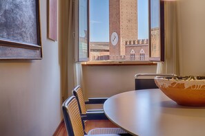 Torre del Mangia, the center of Siena seen from a window of the apartment